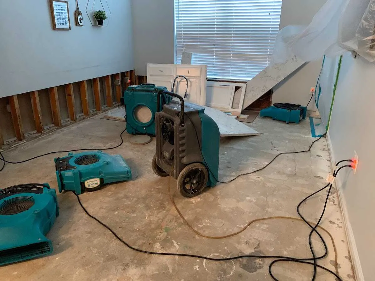 Dehumidifier in flood-cut room for Water Damage Restoration in Port Chester